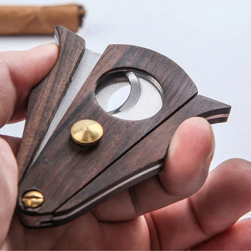 Double Guillotine Wood Cigar Cutter made with stainless steel and blade lock.